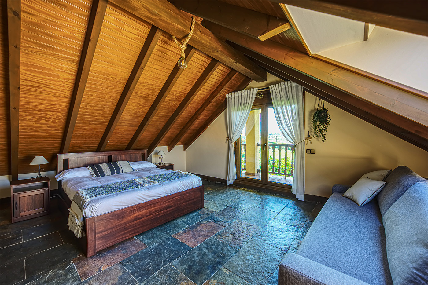 First-floor bedroom with sloping ceilings